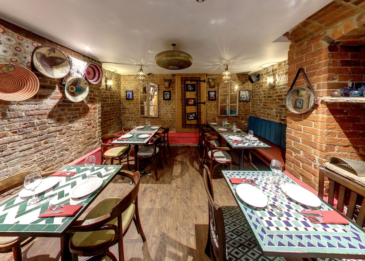 Exposed-brick dining space at Tarboush Tring, Lebanese & Mediterranean restaurant, Tring